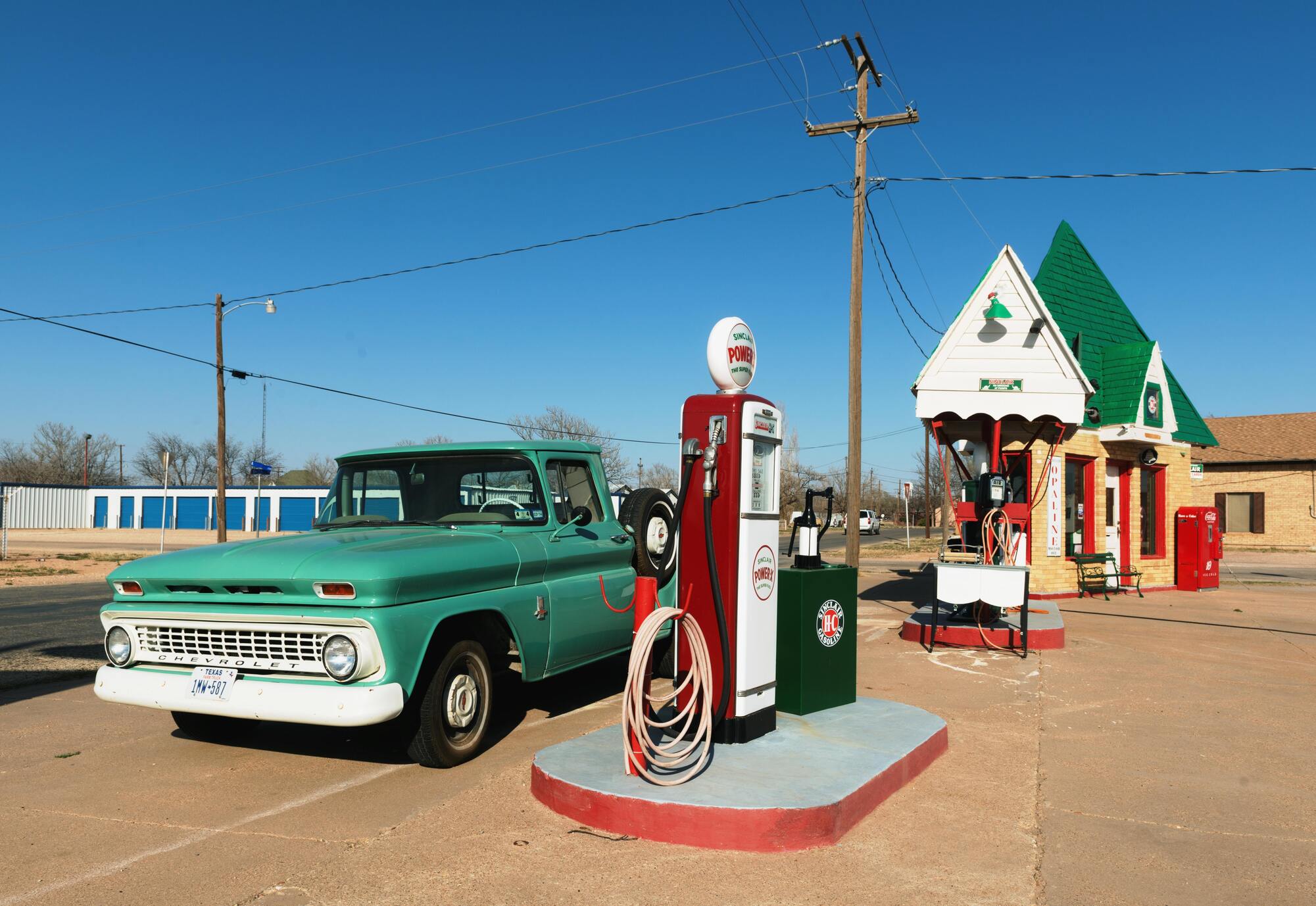 classic car at a gas station