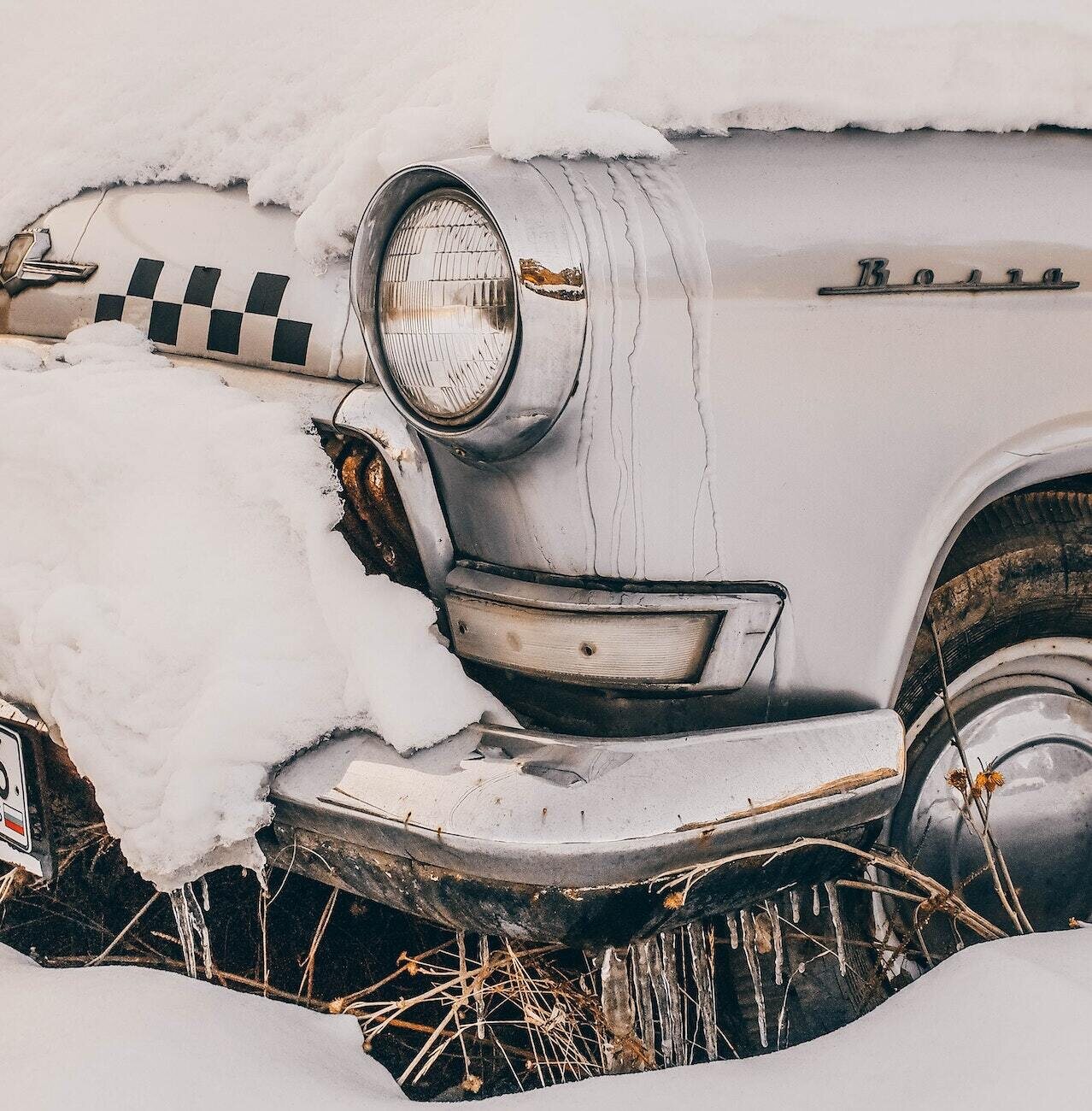 snow-covered car